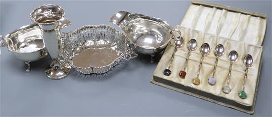 A pair of George V silver sauceboats, a pierced silver two handled dish, a silver vase and cased set of Hong Kong spoons